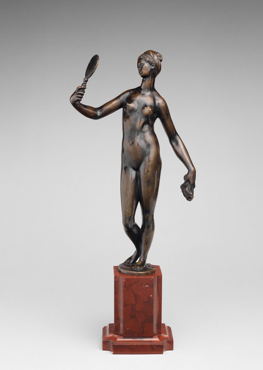 A painted study of a bather, seated and turned inward